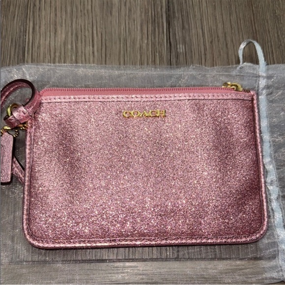 Coach Handbags - Coach Rose Pink Glitter Wristlet